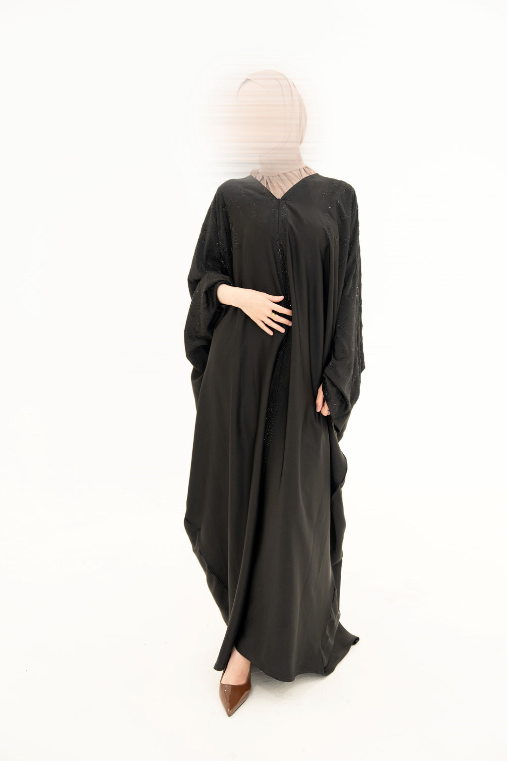 ABAYA DINA